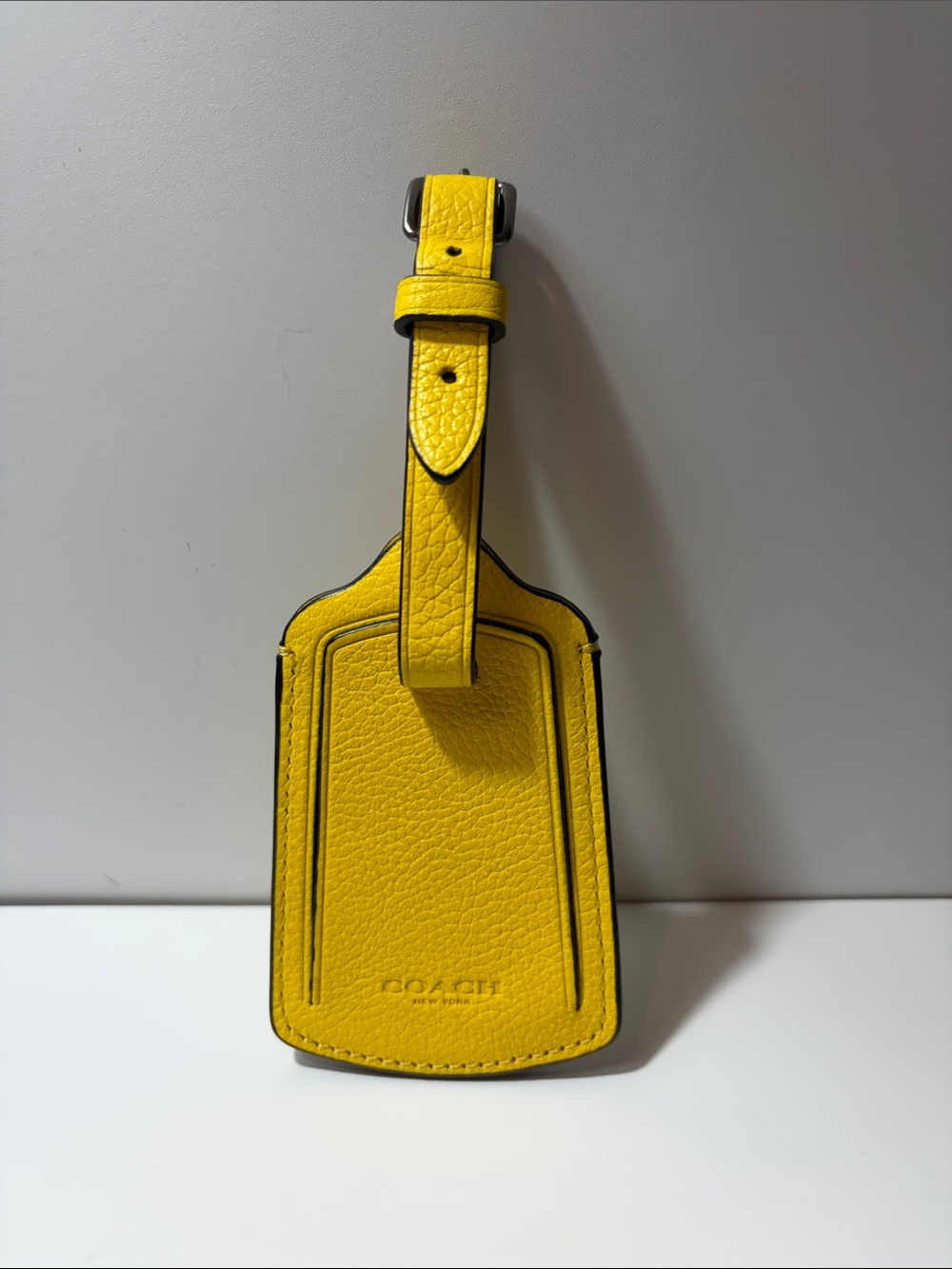 Coach Yellow Pebbled Leather Luggage Tag